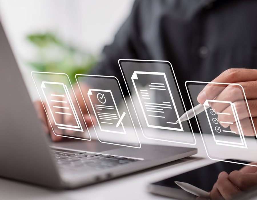 Paperless workplace idea, e signing, electronic signature, document management. Businessman signs an electronic document on a digital document on a virtual notebook screen using a stylus pen.